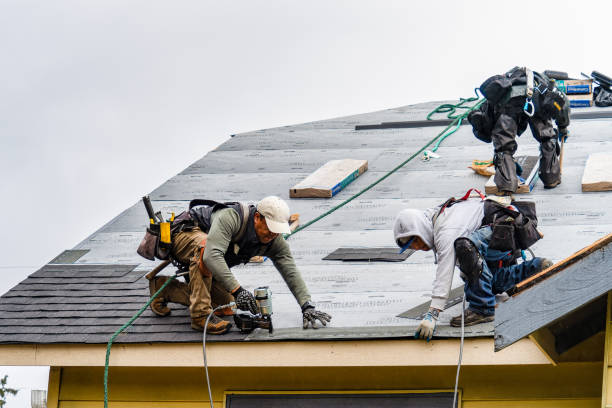 Professional Gutter Installation technician working in Fairview, CA